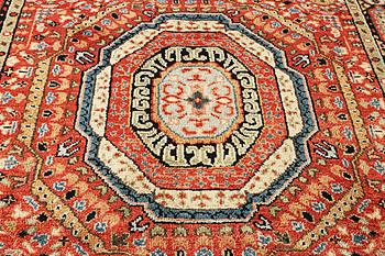 A Mamluk design carpet, c. 304 x 235 cm.