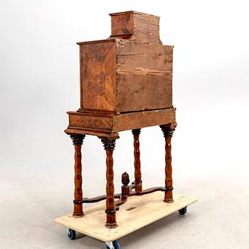 A first half of the 18th century walnut cabinet.