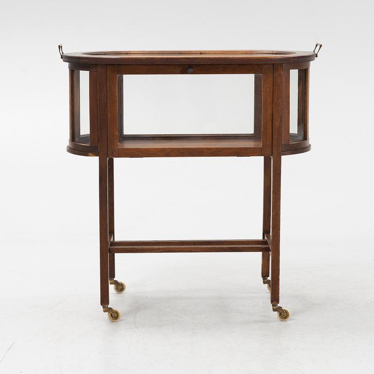 An oak tea trolley, early 20th Century.