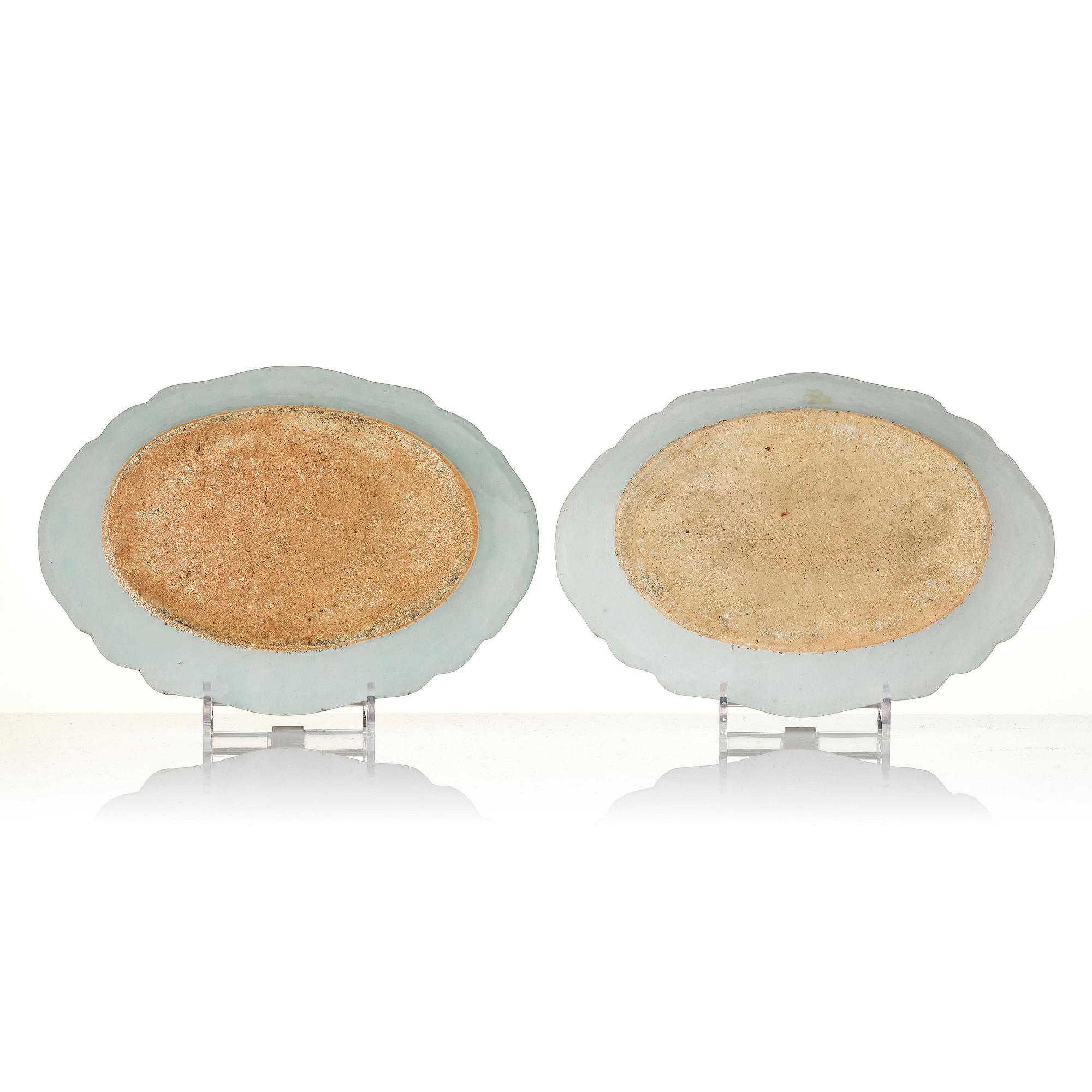 A group of famille rose 'double peacock' serving dishes, Qing dynasty, Qianlong (1736-95). (8 pieces).