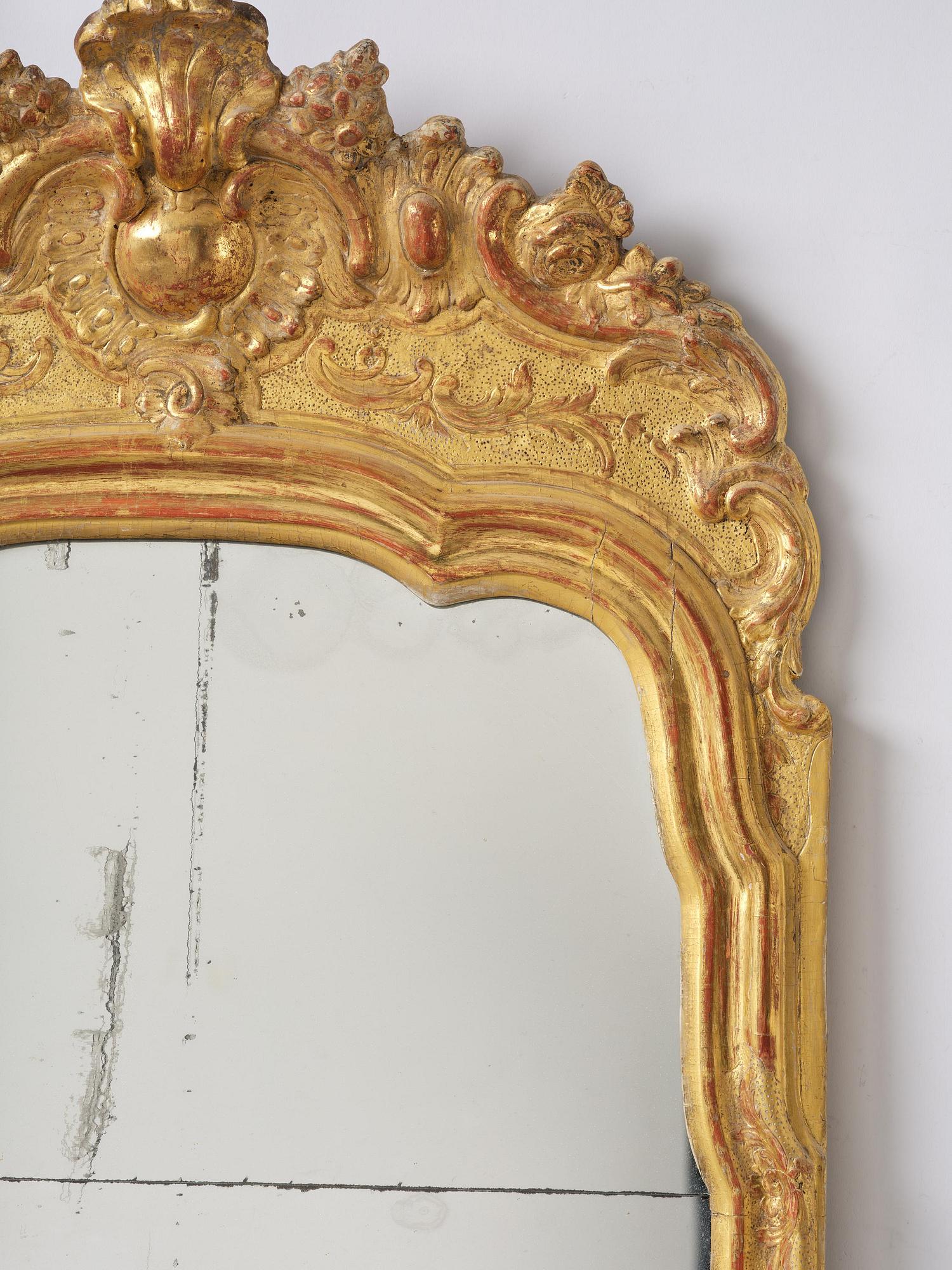 A rocococ giltwood mirror, Stockholm, later part 18th century,