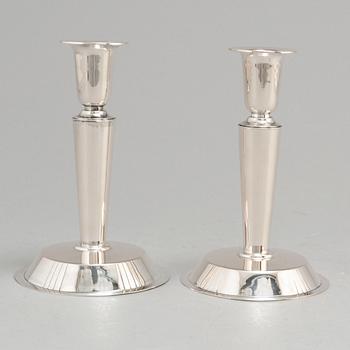 ERIC RÅSTRÖM, a pair of silver candlesticks, Stockholm 1954.