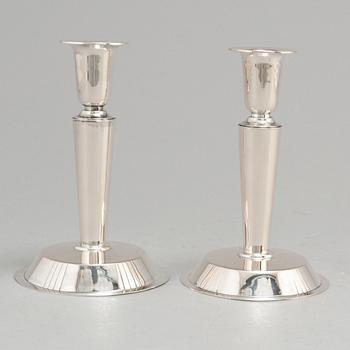 ERIC RÅSTRÖM, a pair of silver candlesticks, Stockholm 1954.