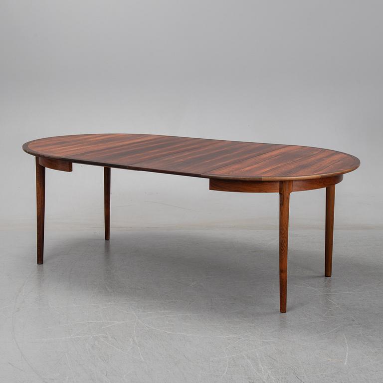 A seven-piece rosewood dining suite, 1960's/70's.