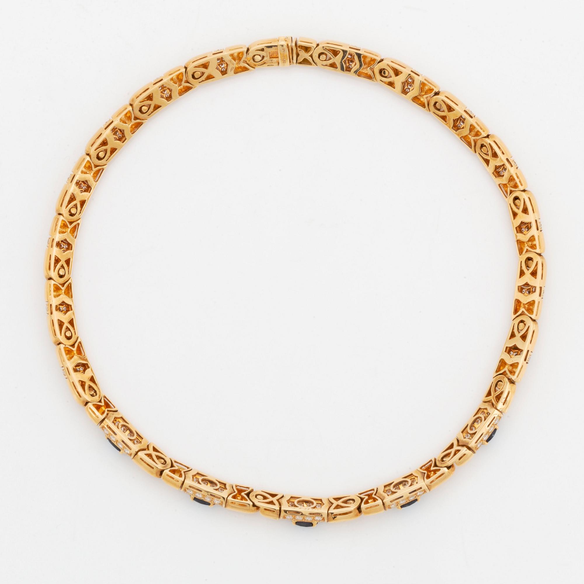 A Bulgari necklace in 18K gold set with faceted sapphires and round brilliant-cut diamonds.