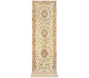 A Keshan runner, c. 385 x 98 cm.