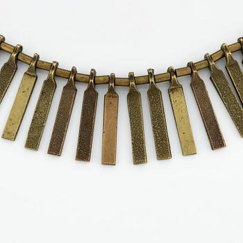 Inga-Britt "Ibe" Dahlquist, a necklace, bronze, "Nefertiti".