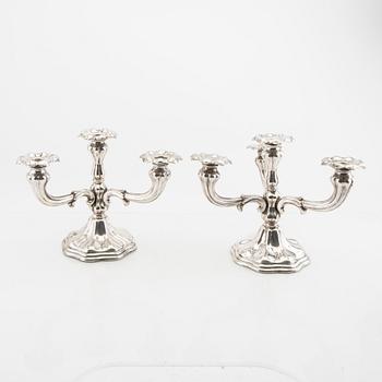 A Swdish 20th century pair of silver candelabra maark of CG Hallberg Stocholm 1946.