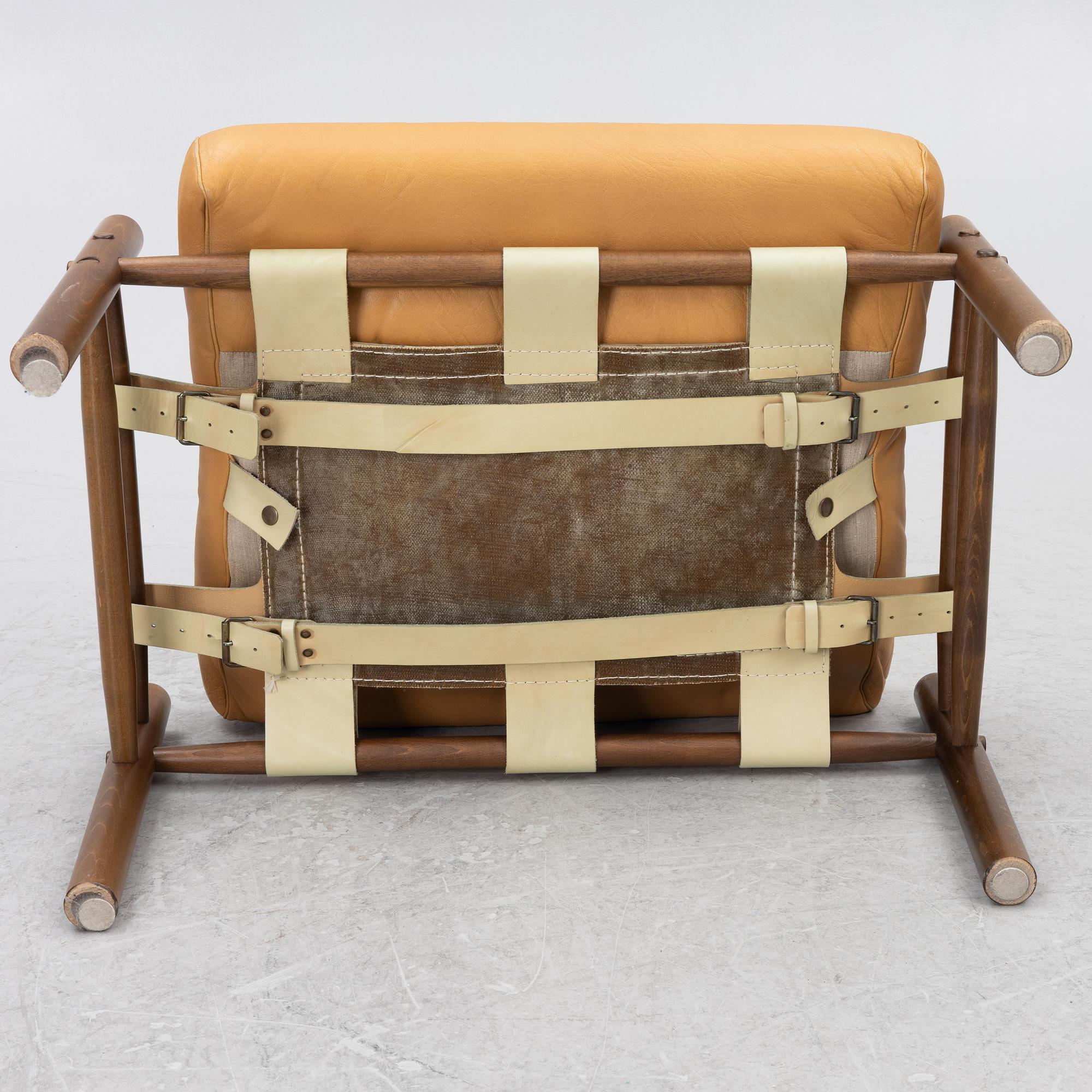 Arne Norell, Armchair with an ottoman, 'Inka', Norell Möbel AB, 1970s.