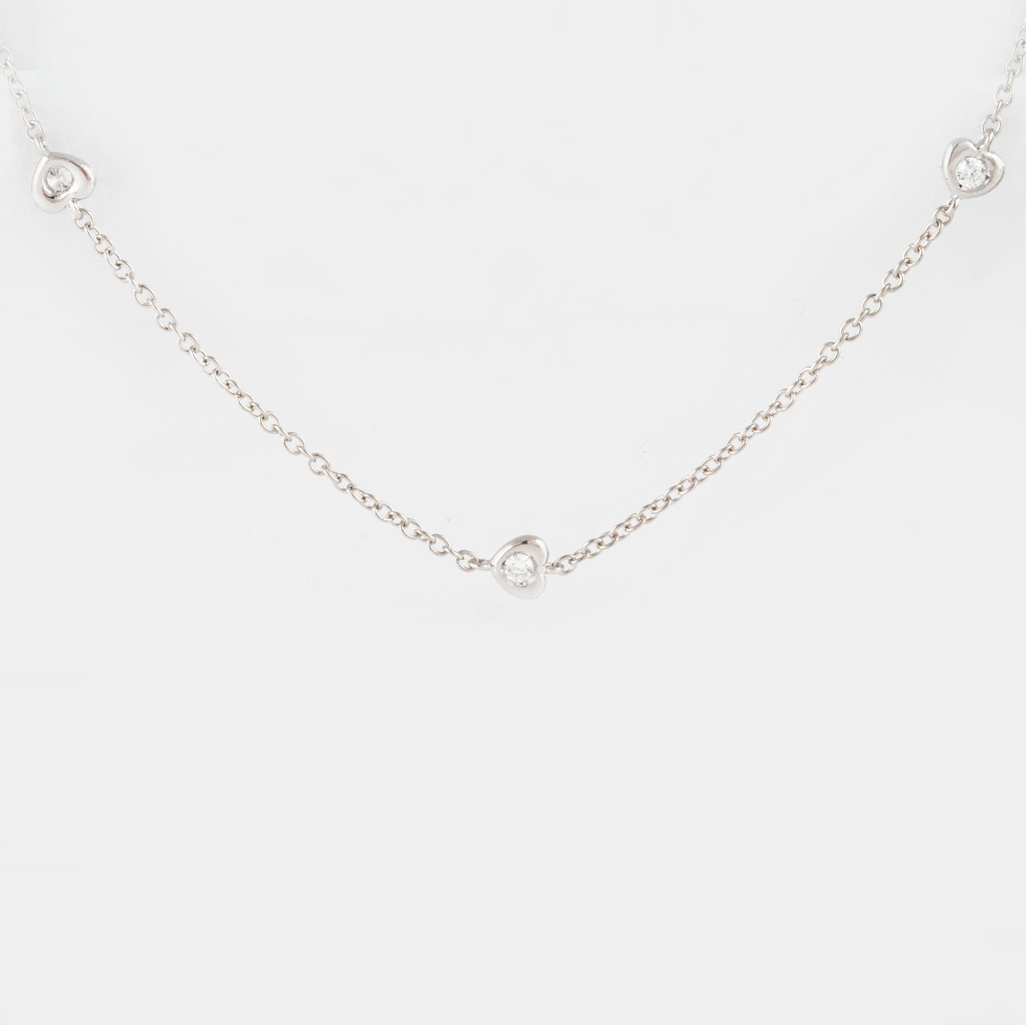 COLLIER, 18K vitguld med 10 briljantslipade diamanter ca 0.25 ct. Vikt 3,3 gram.