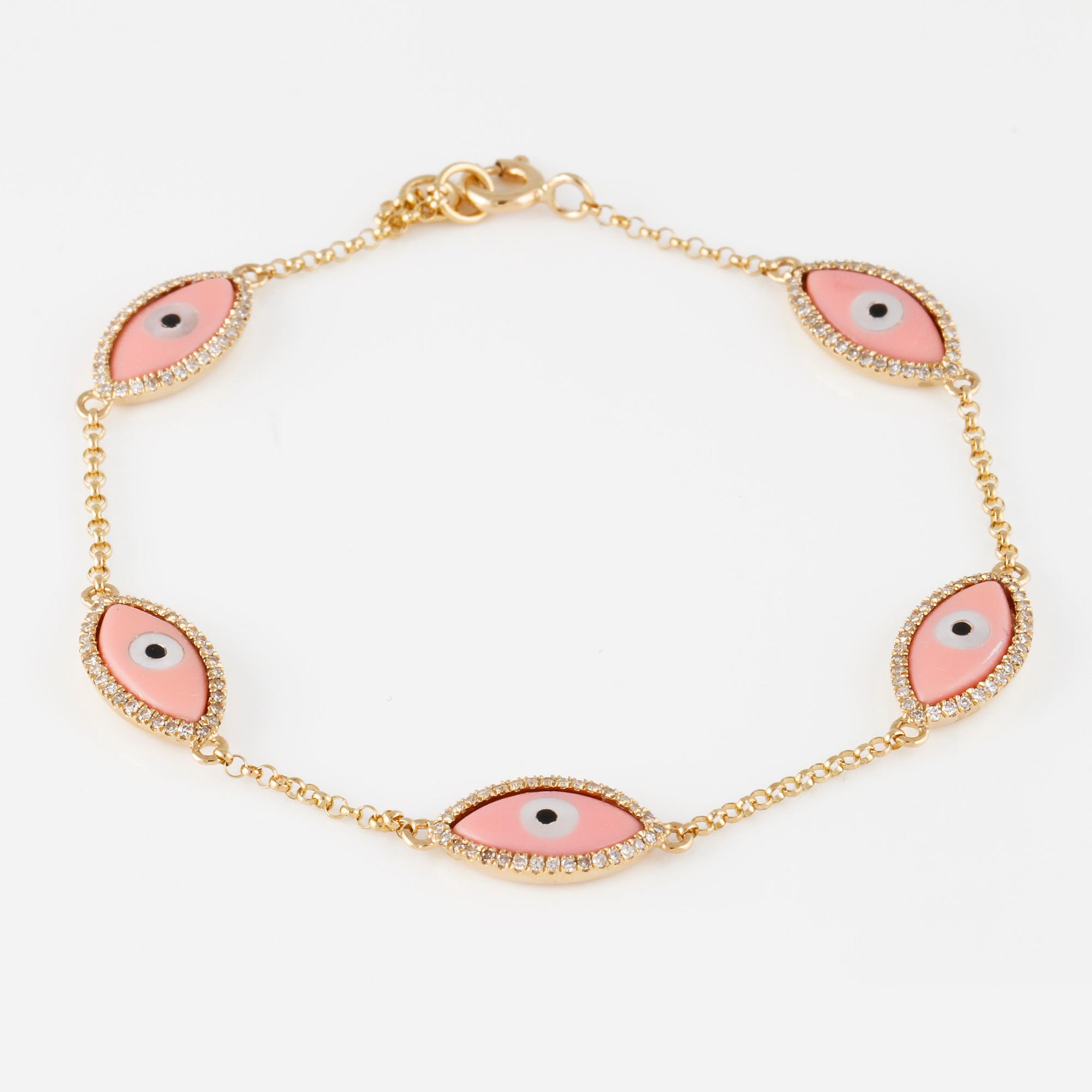 ARMBAND, 18K guld med briljantslipade diamanter ca 0.30 ct, pärlemor samt emalj. Vikt 3,5 gram.