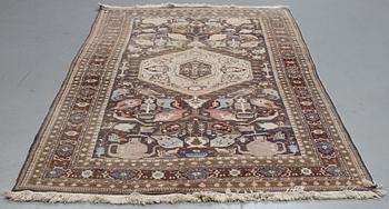 A carpet, semi-antique/Old Ardabil, ca 264 x 272 cm.