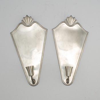 A pair of Swedish pewter Art deco wall scones from Ystad Metall, 1931.