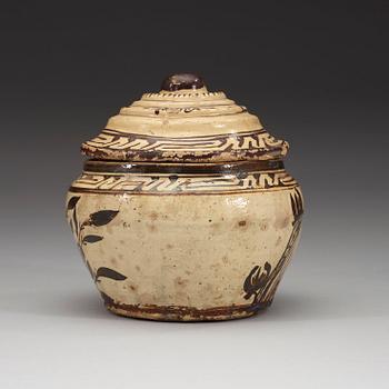 A Cizhou ware pot with cover, presumably Yuan dynasty (1260-1370).