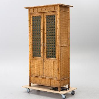A wardrobe, circa 1900.