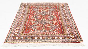 A rug, 215 x 130 cm.