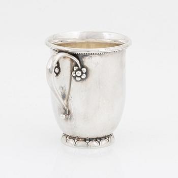 Georg Jensen, a sterling silver cup with holder, Denmark, post 1945.