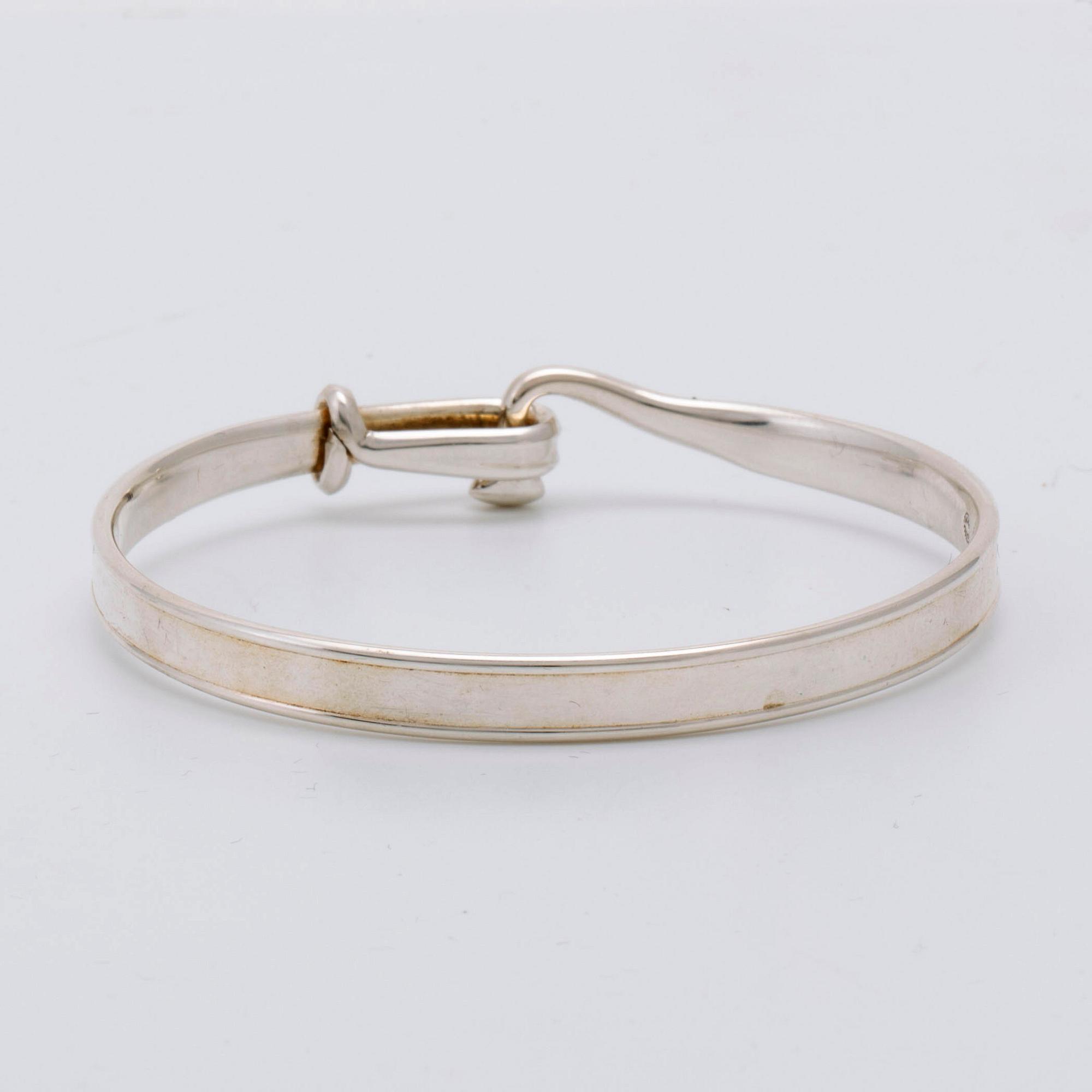 Georg Jensen bangle sterling silver, opens with a hook, design Torun Bülow-Hübe.