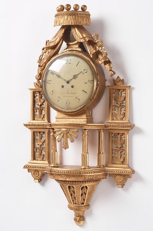 A late Gustavian giltwood cartel clock by E. Rundelius (watchmaker in Stockholm 1793-1815).