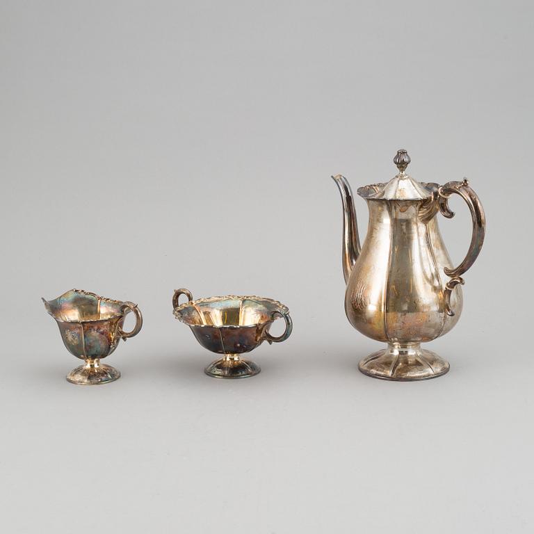 A silver coffee pot, creamer and sugar bowl. Kultakeskus Oy, Hämeenlinna, Finland 1943.
