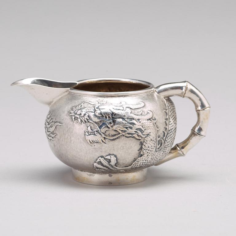 A Chinese four piece silver tea set, Luen Wo, Shanghai, 1875-1925.