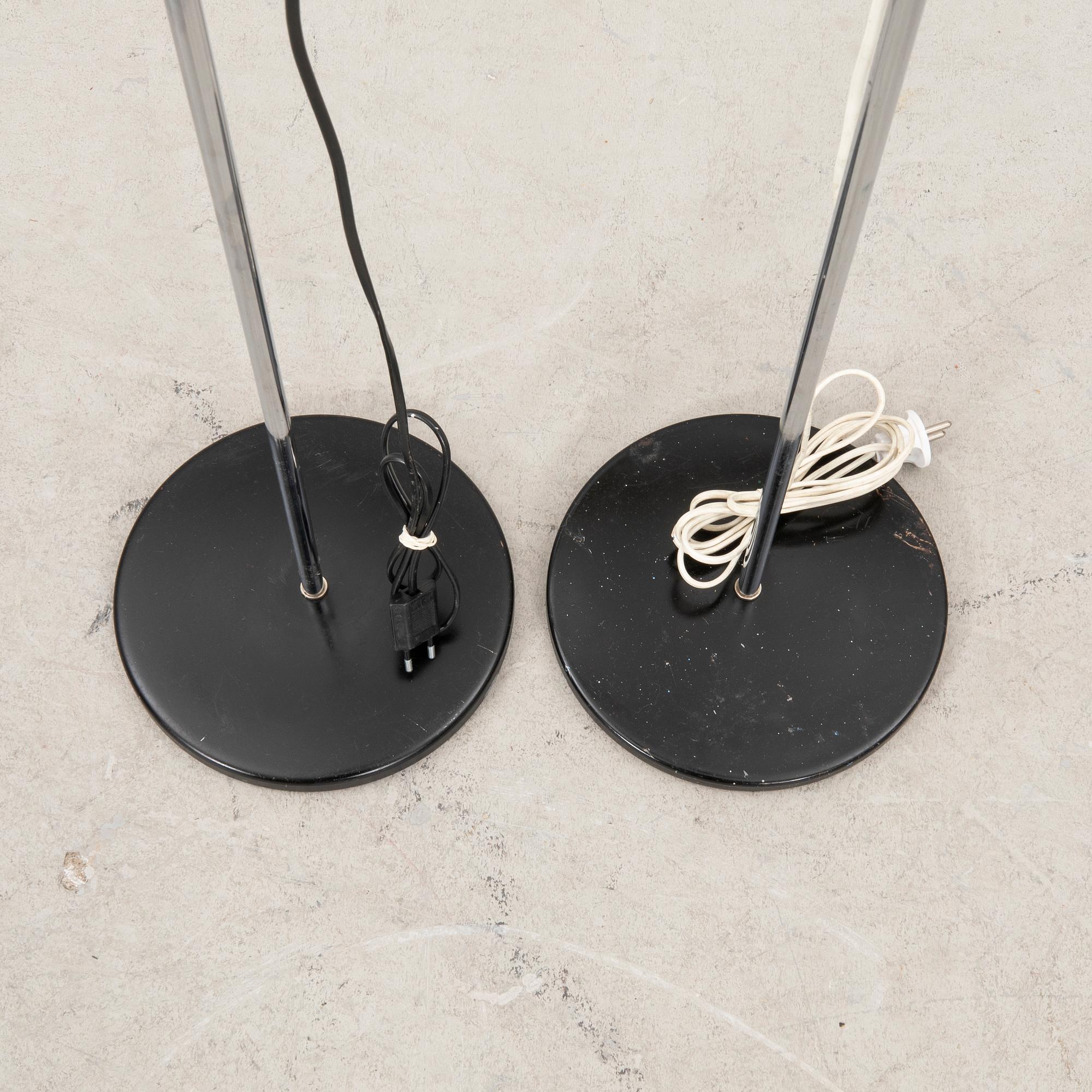 A pair of Heimi steel 1970s floor lamps.