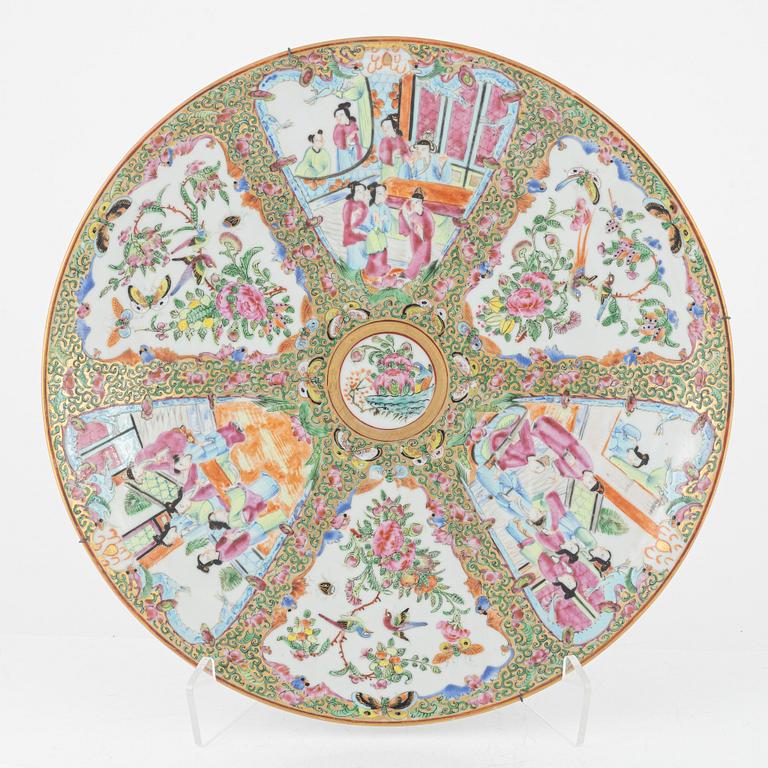 A Kanton porcelain dish and two porcelain plates, China, 19th century.