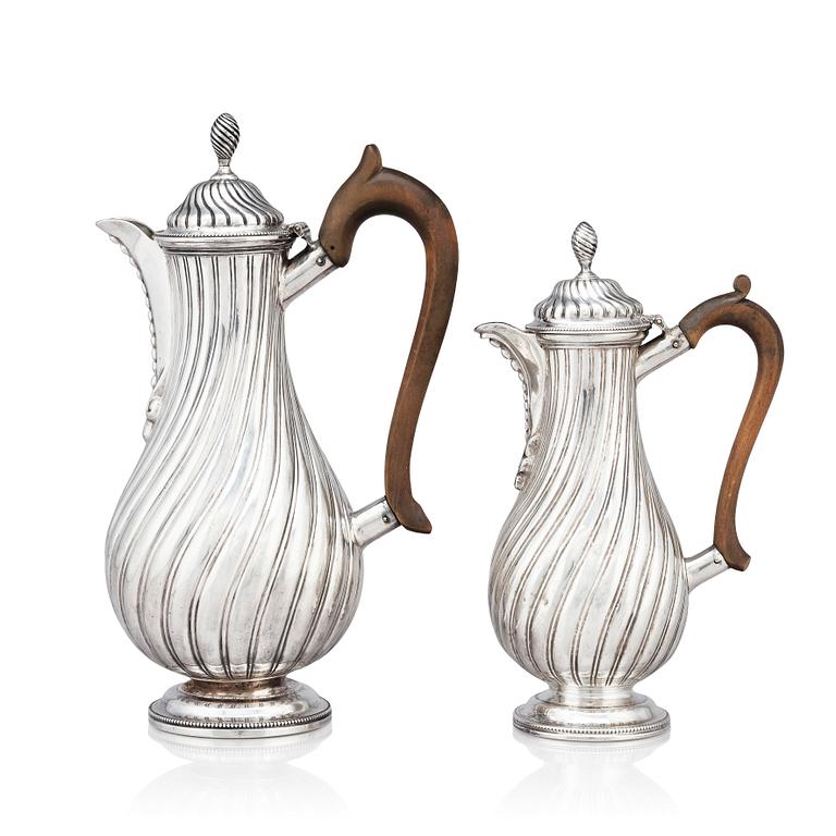 A Victorian silver coffee pot and a milk pot, Martin Hall & Co Ltd, London 1878 and Charles Stuart Harris, London 1877.