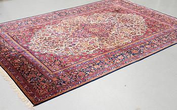 A carpet, semi-antique/old silk Kashan, ca 318,5 x 213,5 cm.