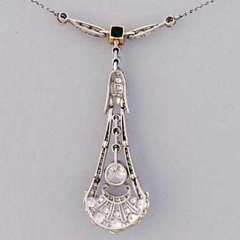 A PENDANT, old and 8/8 cut diamonds, emerald, platinum. Art Deco, c. 1920s.