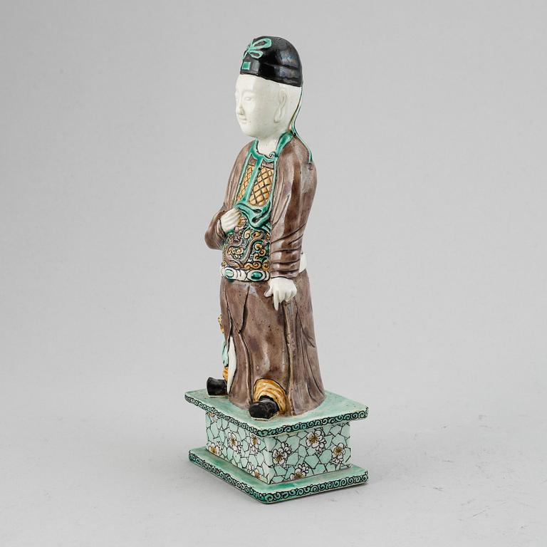 A porcelain figure of a scholar, Qing dynasty, 18th Century.