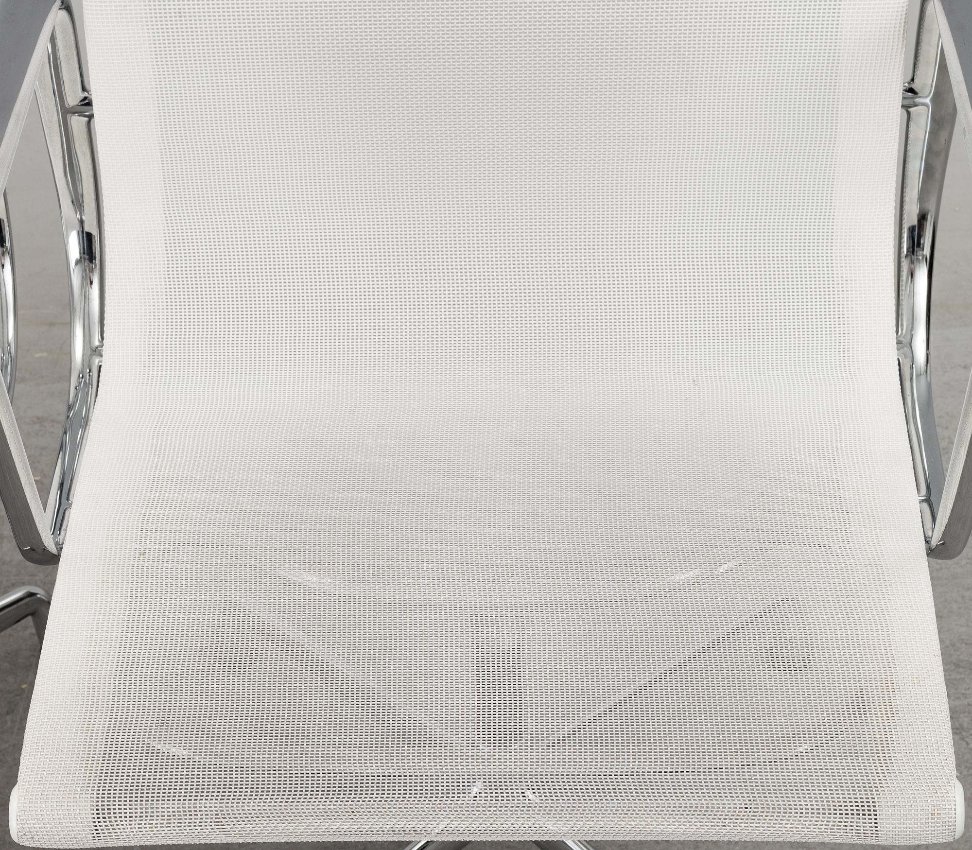 A pair of 'EA 108' desk chairs by Charles & Ray Eames for Vitra.