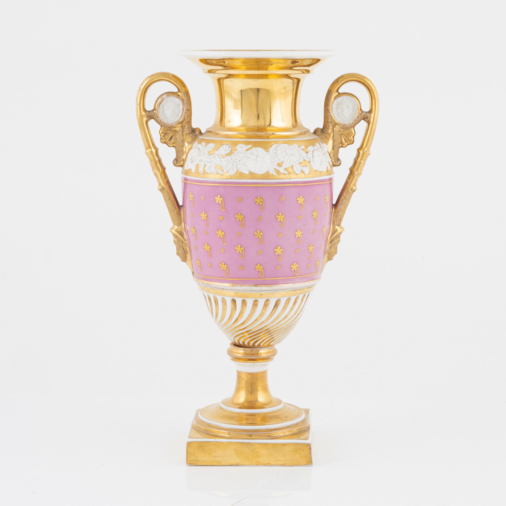 A gilt Empire porcelain vase, 19th Century.