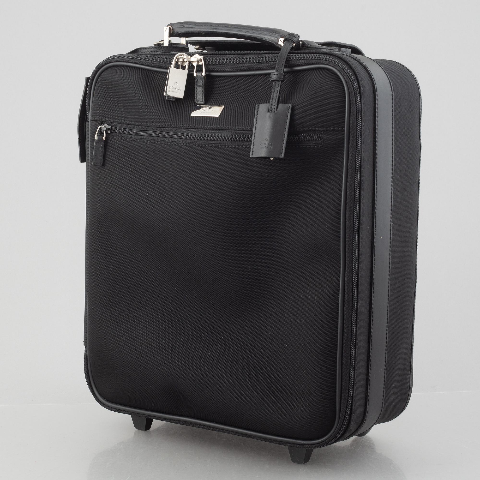 Gucci, suitcase/cabin bag.