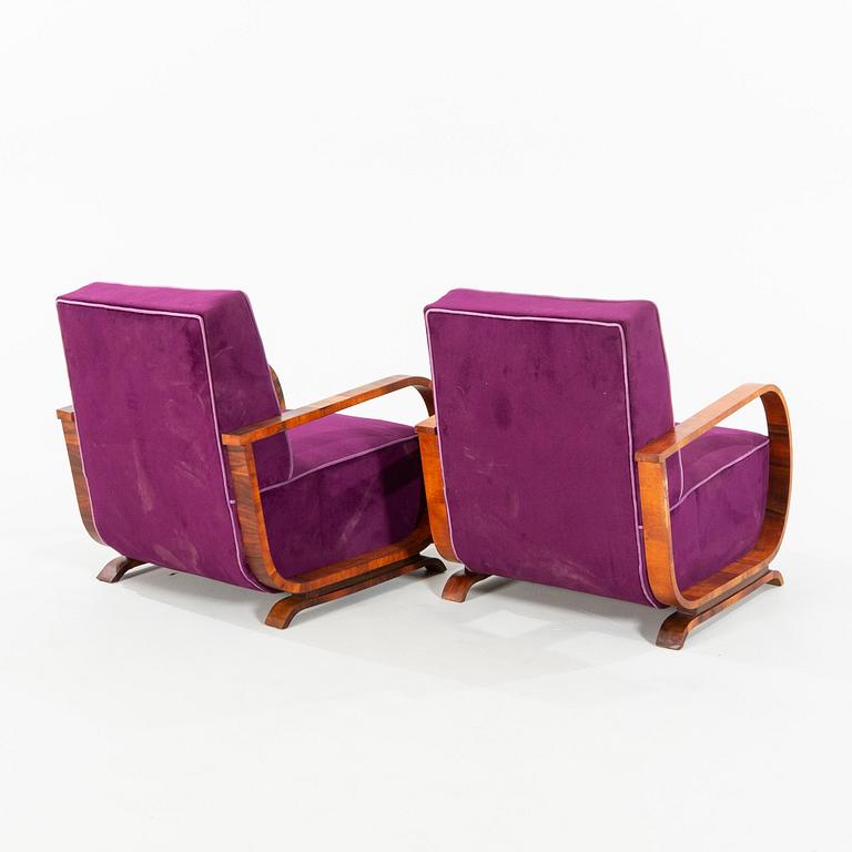 A pair of Art Deco easy chairs from the first half of the 20th century.