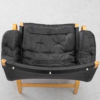 Bruno Mathsson, a 'Pernilla' armchair, Dux, Sweden, later part of the 20th century.