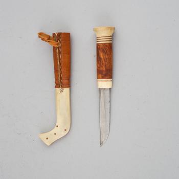 Andreas Poggast, a reindeer horn Sami knife, signed.