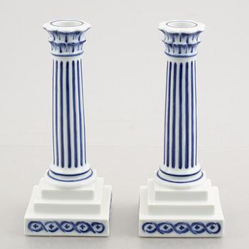 A pair of 'Blue Fluted'/'Musselmalet' porcelain candle sticks, Royal Copenhagen, model 2119, 1920s/30s.