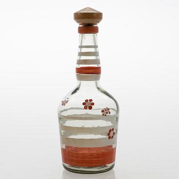 A set of 6 snapsglasses and a bottle designed by Aino Aalto for Karhula in the 1930-1940's.