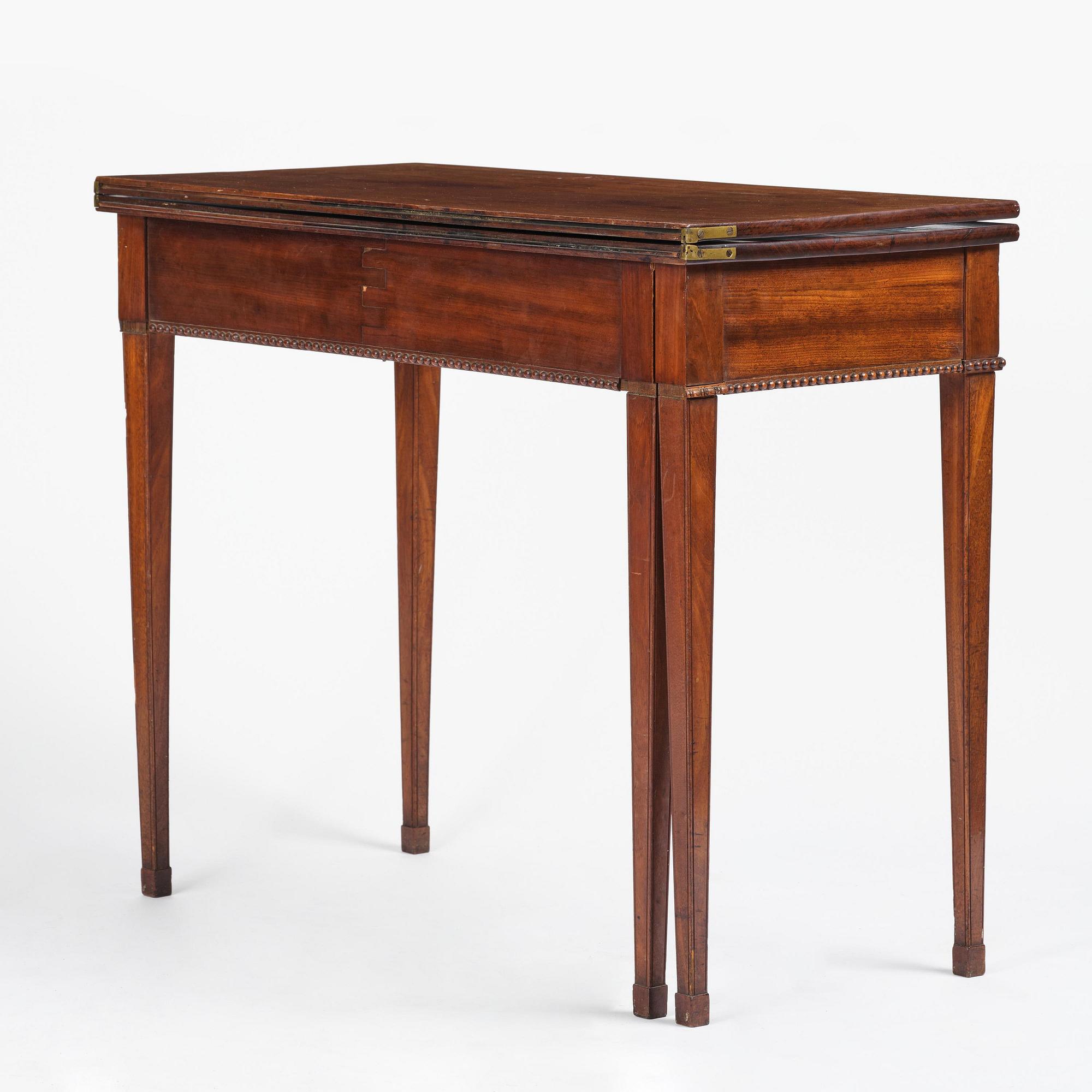 A late Gustavian mahogany cards table, Stockholm, late 18th century.