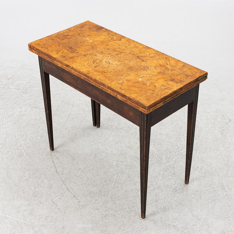 A 19th century card table.