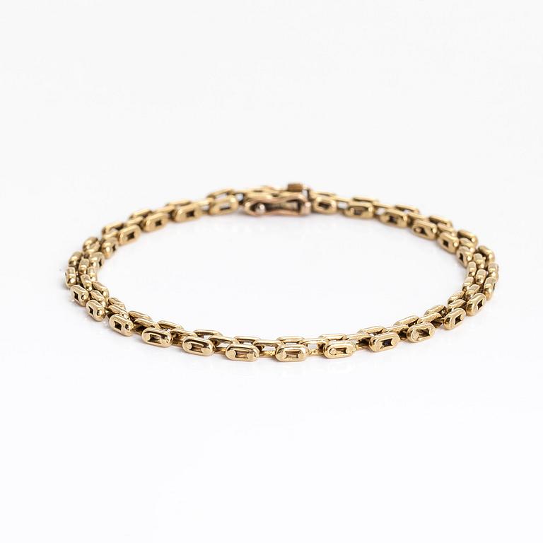 Necklace, set with a brilliant-cut diamond, and bracelet, 18K gold. Finnish import marks 1990.