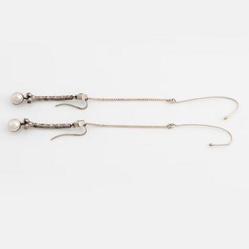 A pair of 18K gold and cultured halfpearl and diamond earrings.