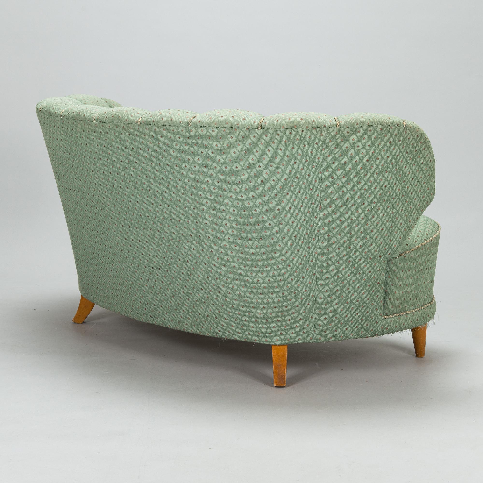 A mid-20th-century sofa.