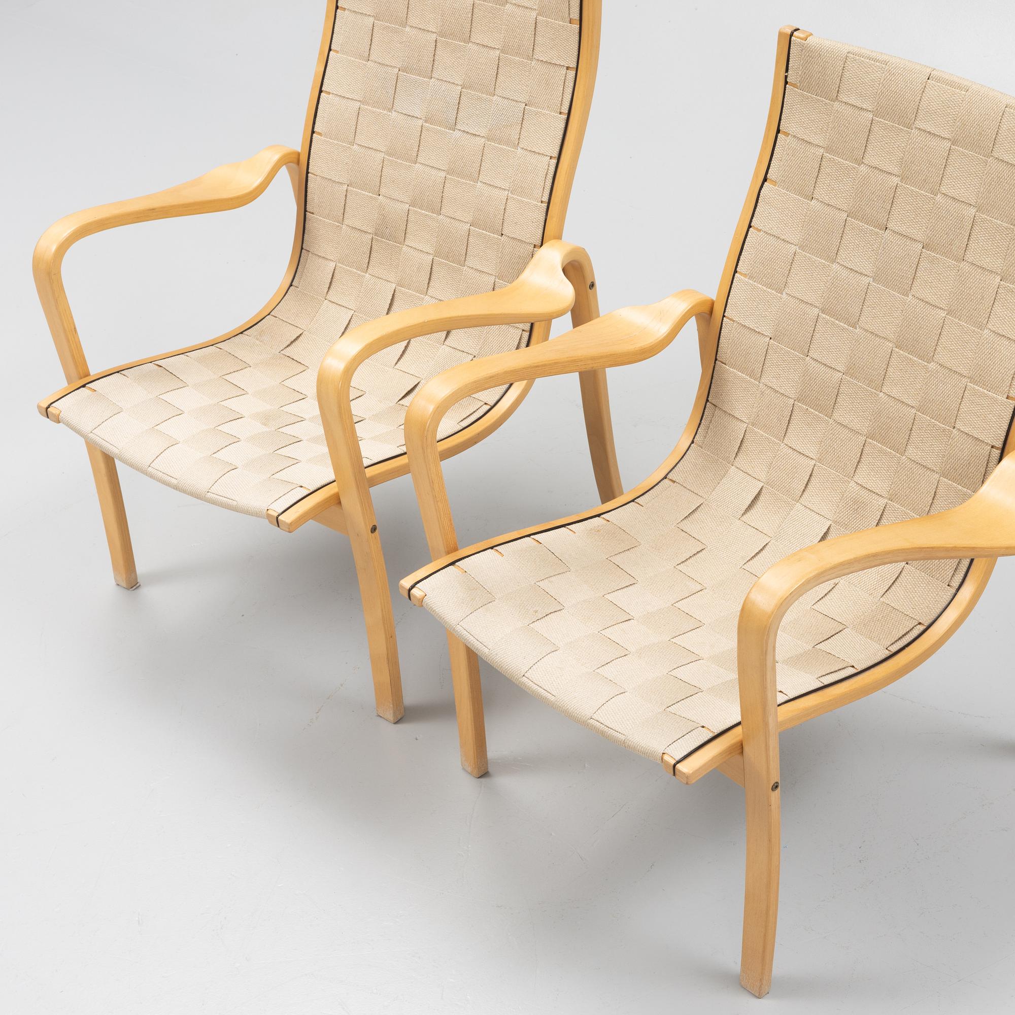 A pair of lounge chairs from Källemo.