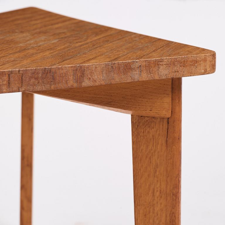 Carl-Axel Acking, a triangular low table, Nordiska Kompaniet, 1940-50s. Provenance Carl-Axel Acking.