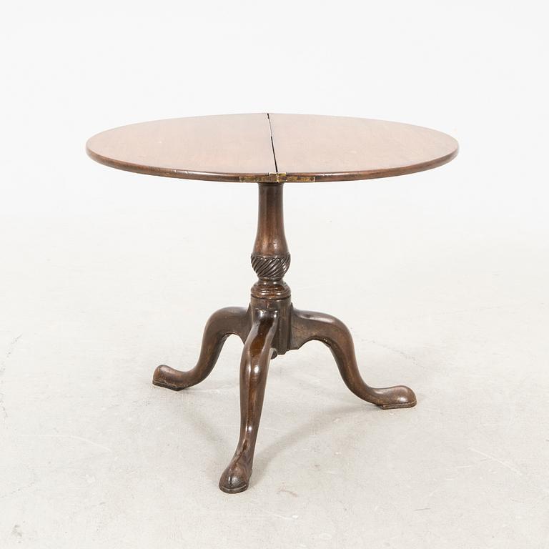 An English Queen Anne mahogany folding table 18th century.