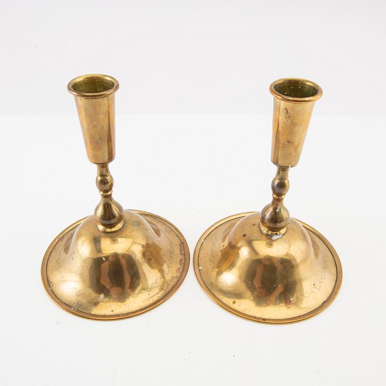 Estrid Ericson, a pair of candlesticks for Firma Svenskt Tenn, mid-20th century, brass.