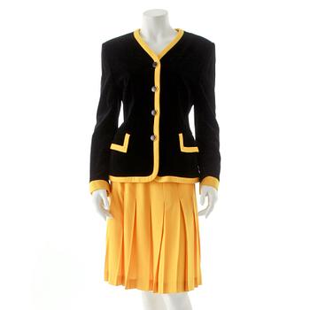 ESCADA, a two-piece black velvet and yellow dress consisting of jacket and skirt.