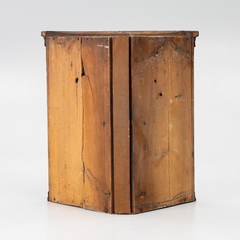 A folk art corner cabinet from Delsbo, Hälsingland dated 1847.